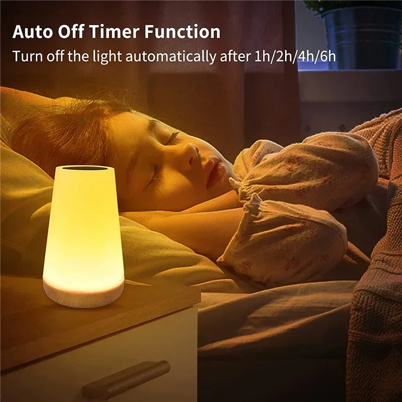 Person sleeping with a night light on a bedside table, highlighting auto-off timer function.